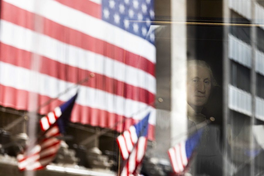 epaselect epa08798899 A portrait of President George Washington in Federal Hall is see with a reflection of the New York Stock Exchange on Wall Street in New York, New York, USA, on 04 November 2020. The Dow Jones industrial average was up over 2% today and global investors are closely watching developments in the undecided United States' presidential election between President Donald J. Trump and former Vice President Joe Biden.  EPA/JUSTIN LANE